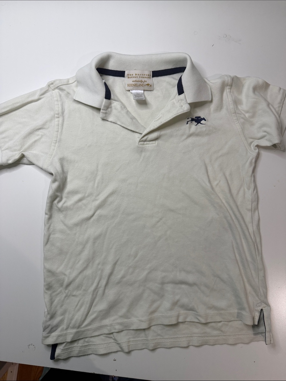 The Beaufort Bonnet Company off White Polo with Navy Keeneland Logo